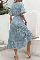 Robe imprimée à volants et pompons